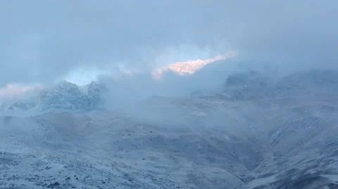 Clouds and Sunrise over Caucasus Mountains Stock Footage 61232715