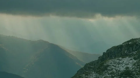 Clouds and sunset time lapse with sunbeams. Mountain landscape. 스톡 동영상 63478402