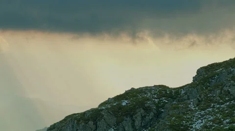 Clouds and sunset time lapse with sunbeams. Mountain landscape. Video stock 63591652