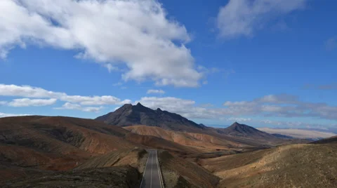 Clouds and traffic in mountain time lapse pan 11143 Stock Footage 32212761