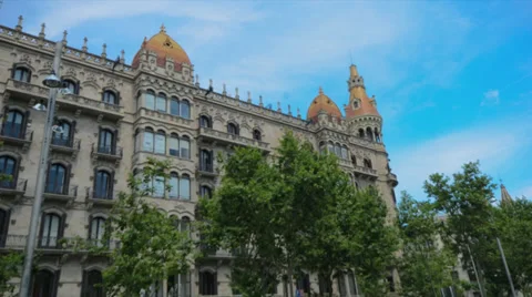Clouds and trees in time lapse at the port of Barcelona in Spain Stock Footage 33721313