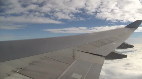 Clouds and wing in flight Stock Footage 1100835