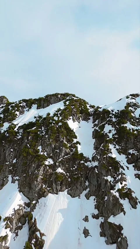 Clouds ans snow over the mountains Stock Footage 273141173