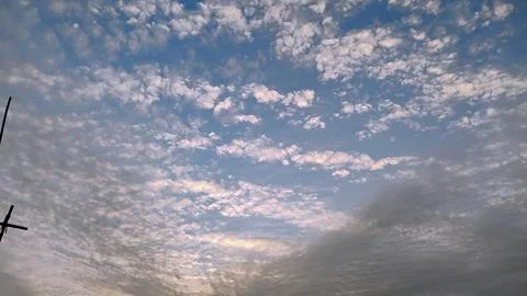 The clouds are altocumulus clouds. Stock Photos