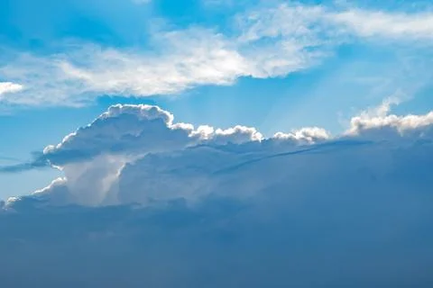 The clouds are Cumulus type with the light of the sun Stock Photos