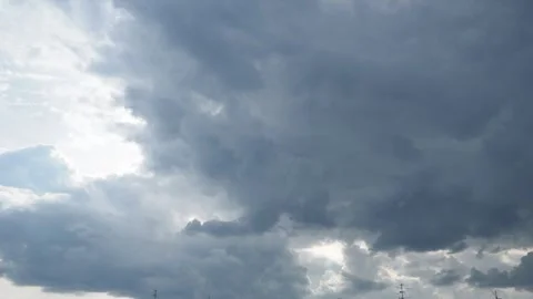 Clouds are floating across the sky, rain is gathering. Weather is getting worse Stock Footage 281008029