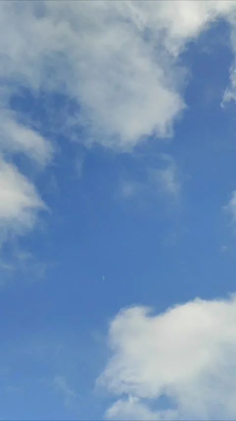 Clouds are floating across the sky 2 Stock Footage 329447220