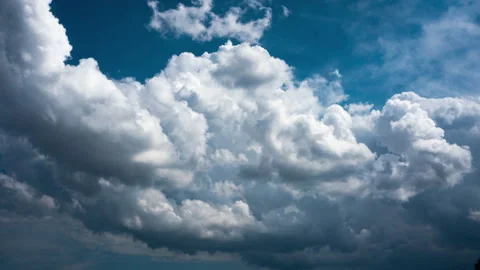 Clouds are flying across the blue sky. Timelapse Stock-Footage 246441364