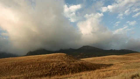 Clouds are flying from the mountains Video stock 72773901
