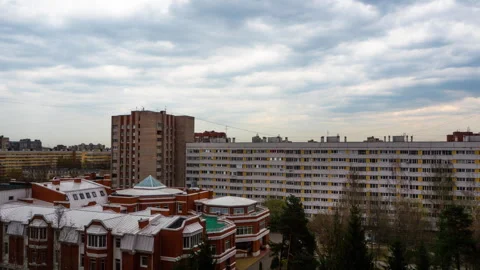 Clouds are flying over a big city. timelapse Video stock 241338675