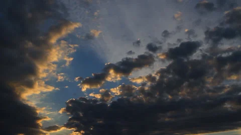 Clouds are illuminated by the setting sun Stock Footage 36552115
