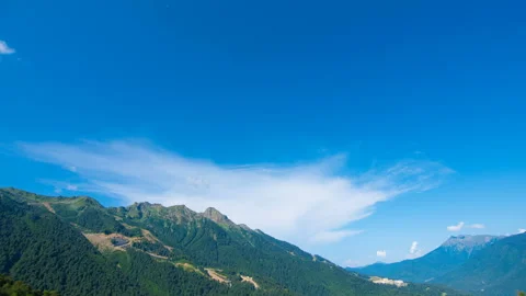 Clouds are melting over the mountains. Timelapse. Stock Footage 87936492