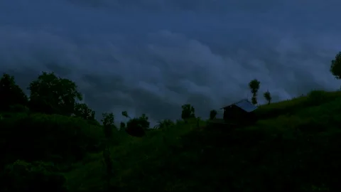 Clouds are moving from below time laps from top of a hill at night . Stock Footage 165470358