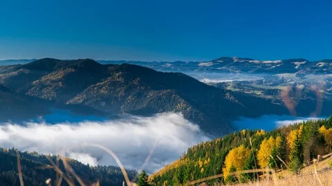 Clouds are moving in a mountain valley Stock Footage 99274409