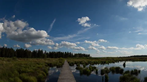 Clouds are moving over a pond Stock Footage 52370613