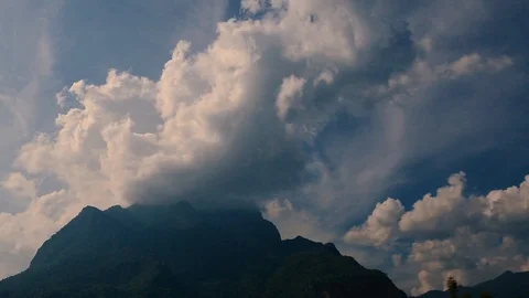 Clouds are moving at the top of mountain view Stock Footage 97207083