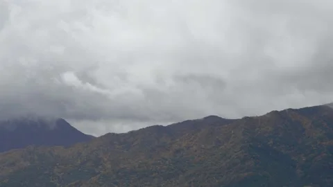 Clouds are passing over the mountain Vídeo Stock 164731775