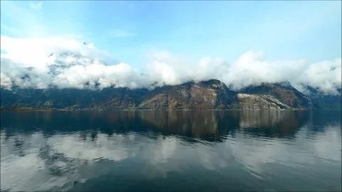 The clouds are reflected in the mirror of the water. Stock Footage 82902642