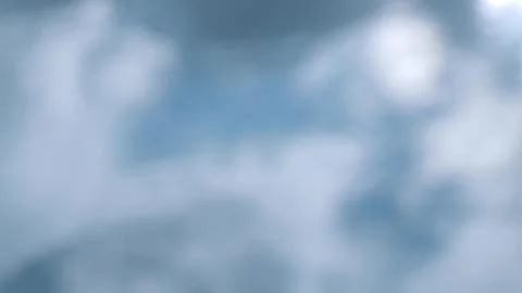 Clouds are reflected on the surface of the water. Closeup shot. Stock Photos