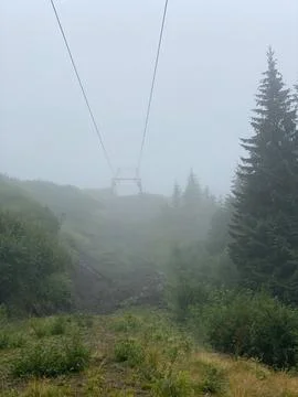 Clouds are rolling through after the rain in the Carpathian Mountains in Ukra Stock Photos