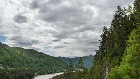 Clouds are running through the sky in the mountains. Stock Footage 90551825