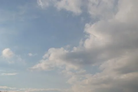 The clouds are saturated and it will rain soon. Stock Photos