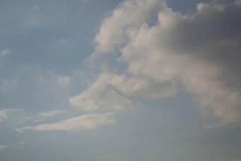 The clouds are saturated and it will rain soon. Stock Photos