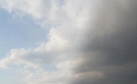 The clouds are saturated and it will rain soon. Stock Photos