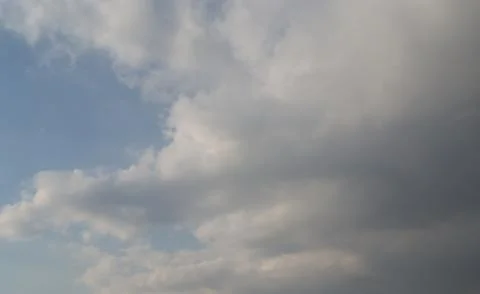 The clouds are saturated and it will rain soon. Stock Photos