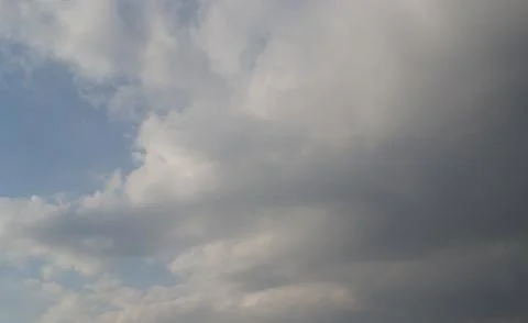 The clouds are saturated and it will rain soon. Stock Photos