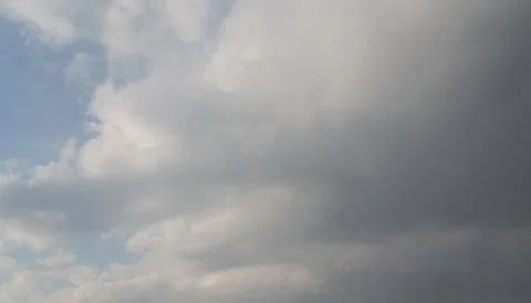 The clouds are saturated and it will rain soon. Stock Photos