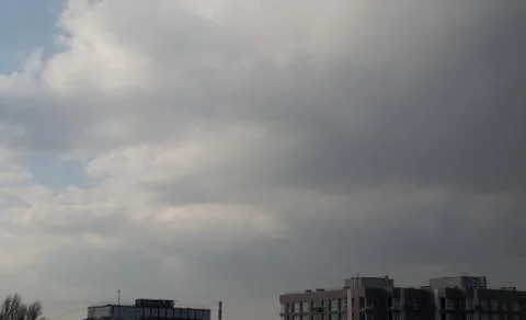The clouds are saturated and it will rain soon. Stock Photos
