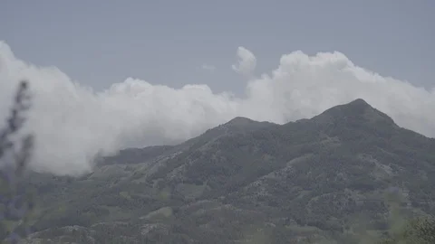 Clouds are on the tops of mountains Stock Footage 115454434