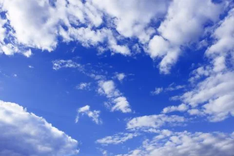 Clouds around blue sky Stock Photos