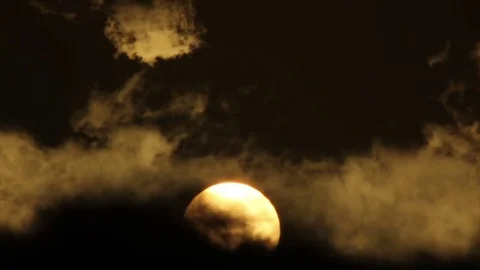 Clouds around bright sun Stock Footage 80602387