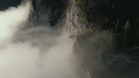 Clouds around the mountain ridge Stock Footage 232273819