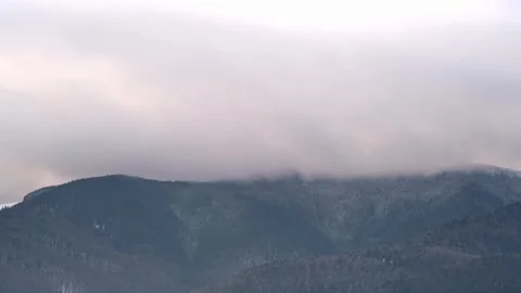 Clouds in the autumn blue mountains Stock Footage 257075055