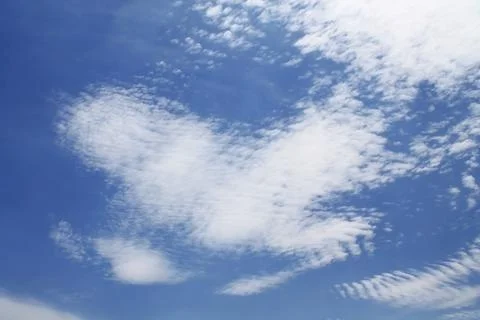 Clouds on a background of blue sky Stock Photos