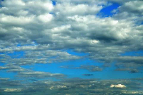 Clouds on the background of bright blue sky, summer day close-up Foto stock