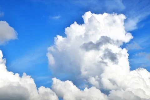 Clouds on the background of bright blue sky, summer day close-up Foto stock