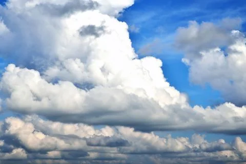 Clouds on the background of bright blue sky, summer day close-up Foto stock