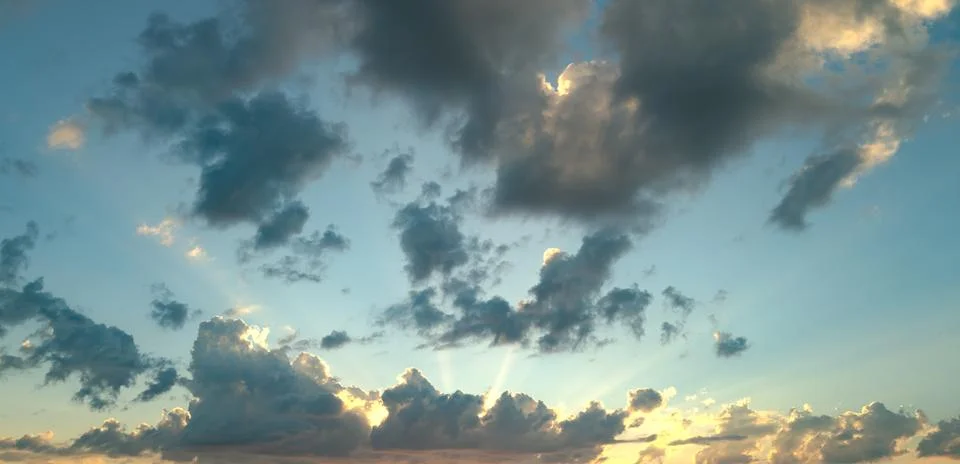 Clouds background. Dramatic Clouds Sunset Background. Sky with clouds in Sunrise Stock Photos