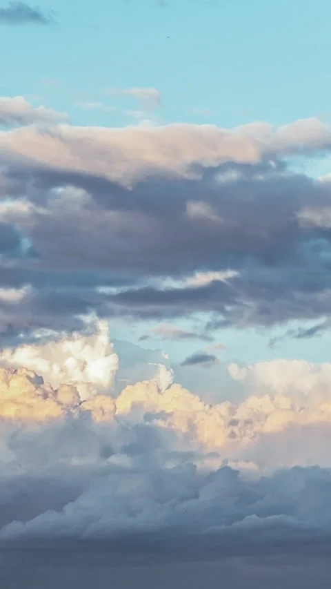 Clouds background. Sunset.  Vertical Time lapse Stock Footage 235609120