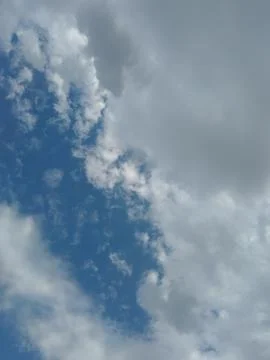 Clouds on a beautiful blue sky Stock Photos