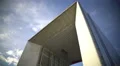 Clouds in beautiful sky above Grande Arche de la Defence in Paris, timelapse 4k or 4k+ Resolution