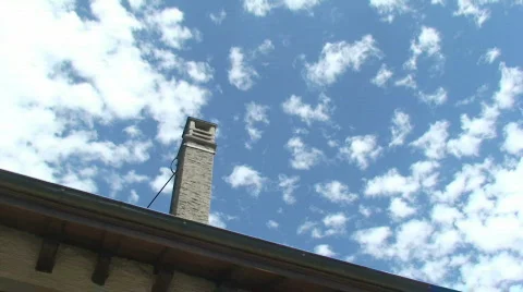 Clouds behind chimney Stock Footage 793014