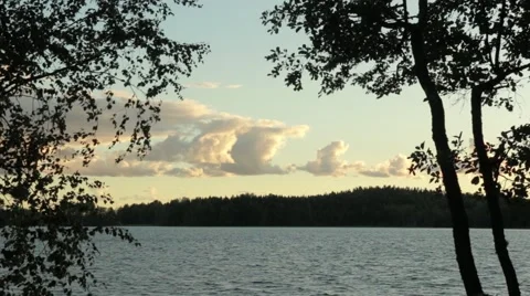 Clouds behind a lake Stock Footage 54545861