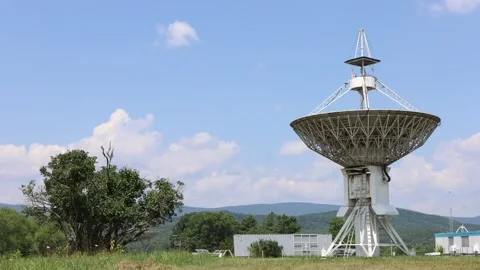 Clouds behind radio telescope  Stock Footage 161053972
