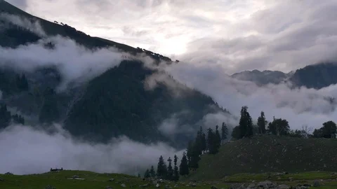 Clouds between the mountains Stock Footage 127594822
