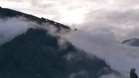 Clouds between the mountains Stock Footage 127600797